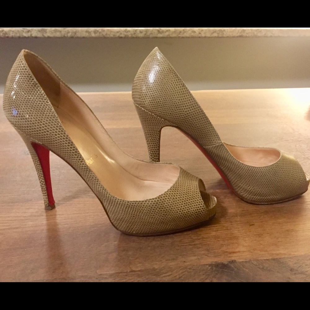 Authentic Christian Louboutin heels in natural.